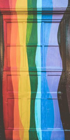 red, yellow, green and blue lines painted on a door