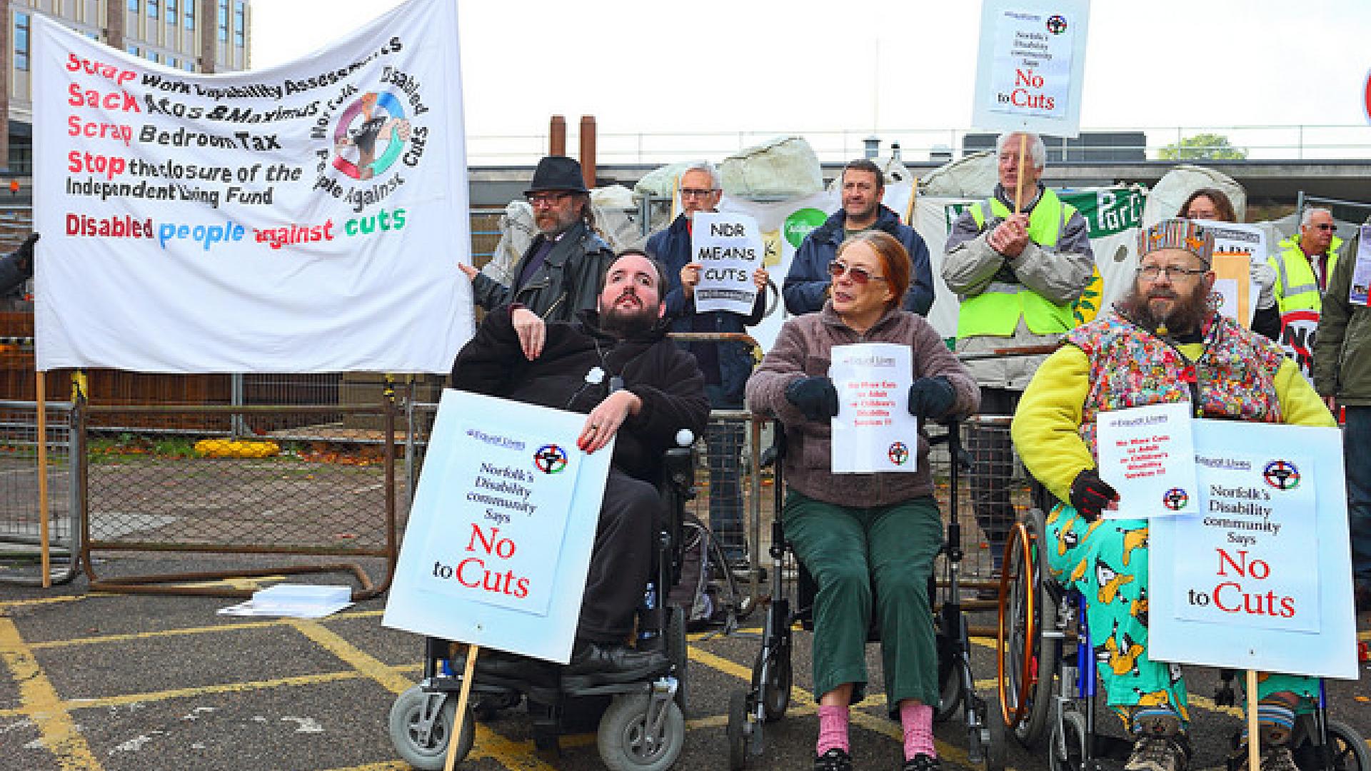 Disabled people protesting