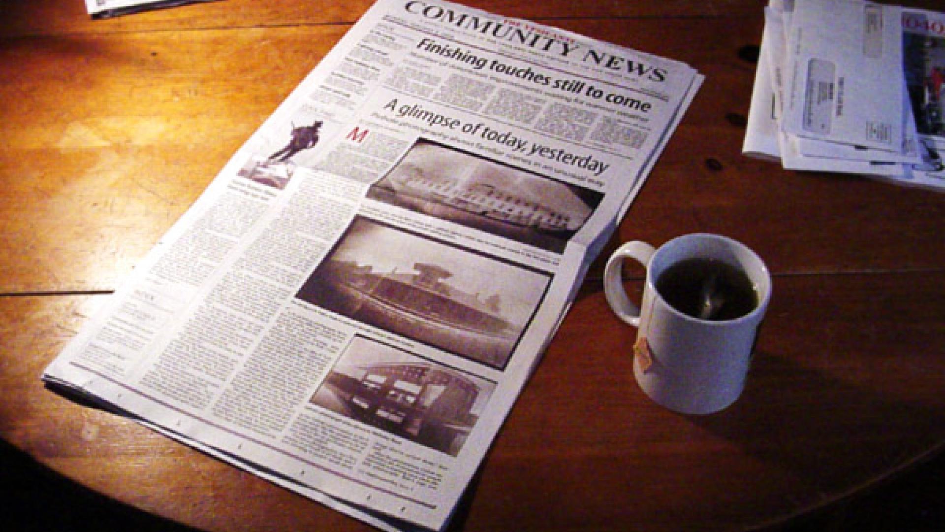 picture of newspaper and cup of tea