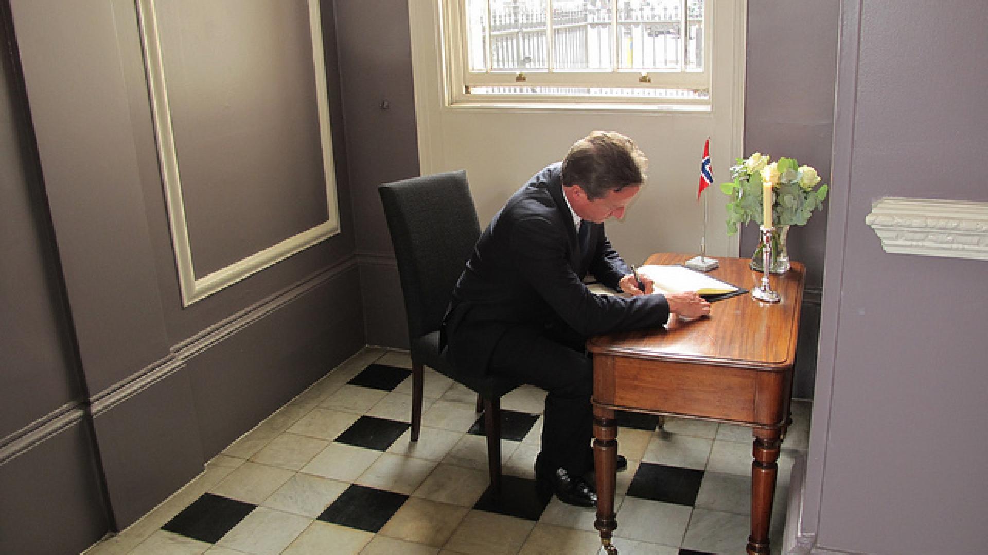 David Cameron at a desk