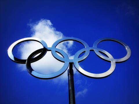 Olympic rings against the sky