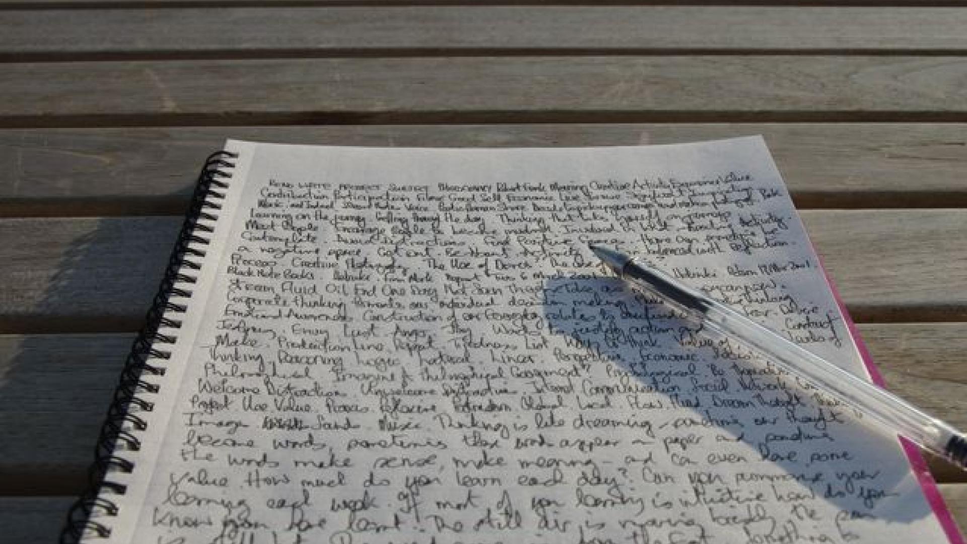 page of writing, complete with pen