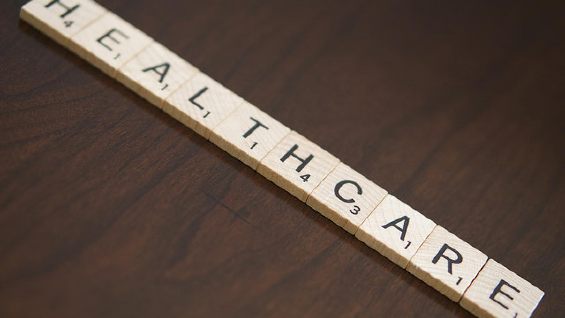 Scrabble letters read 'Healthcare'
