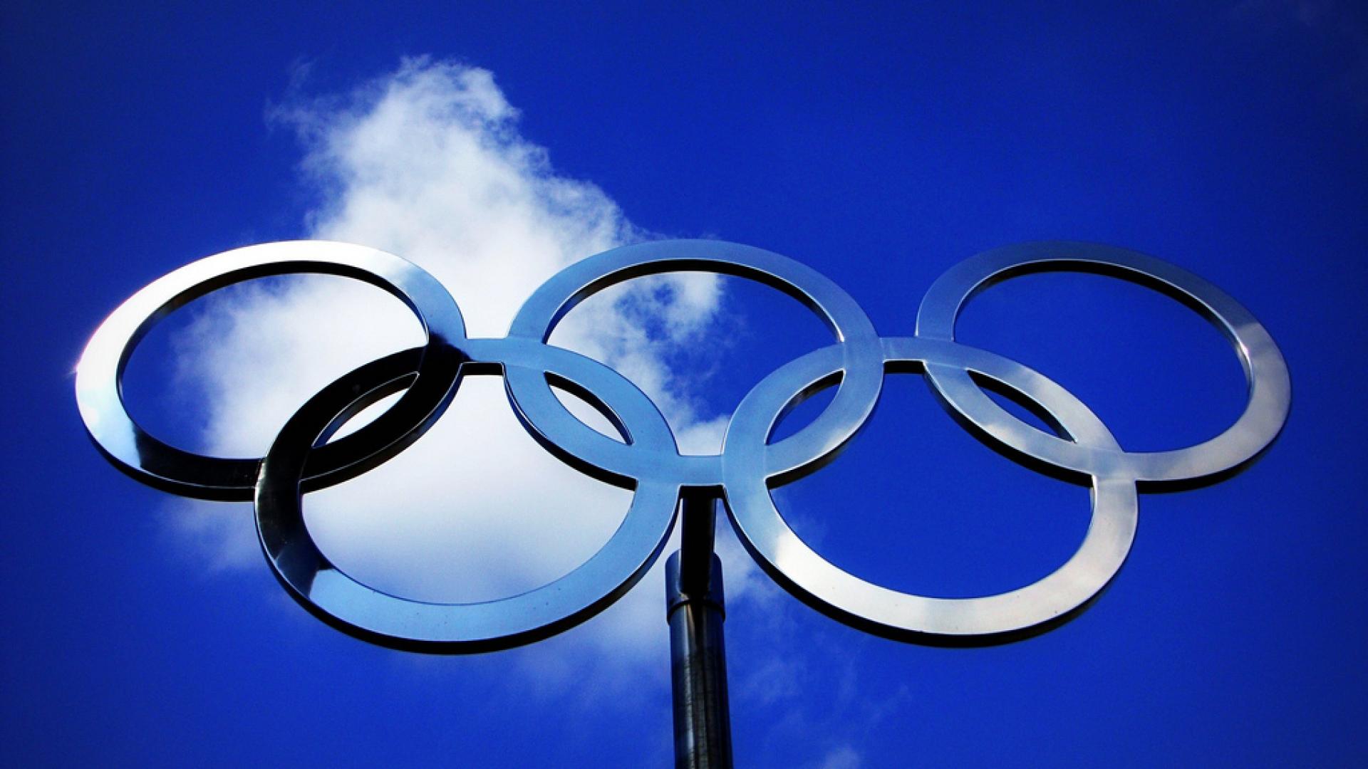 Olympic rings against the sky