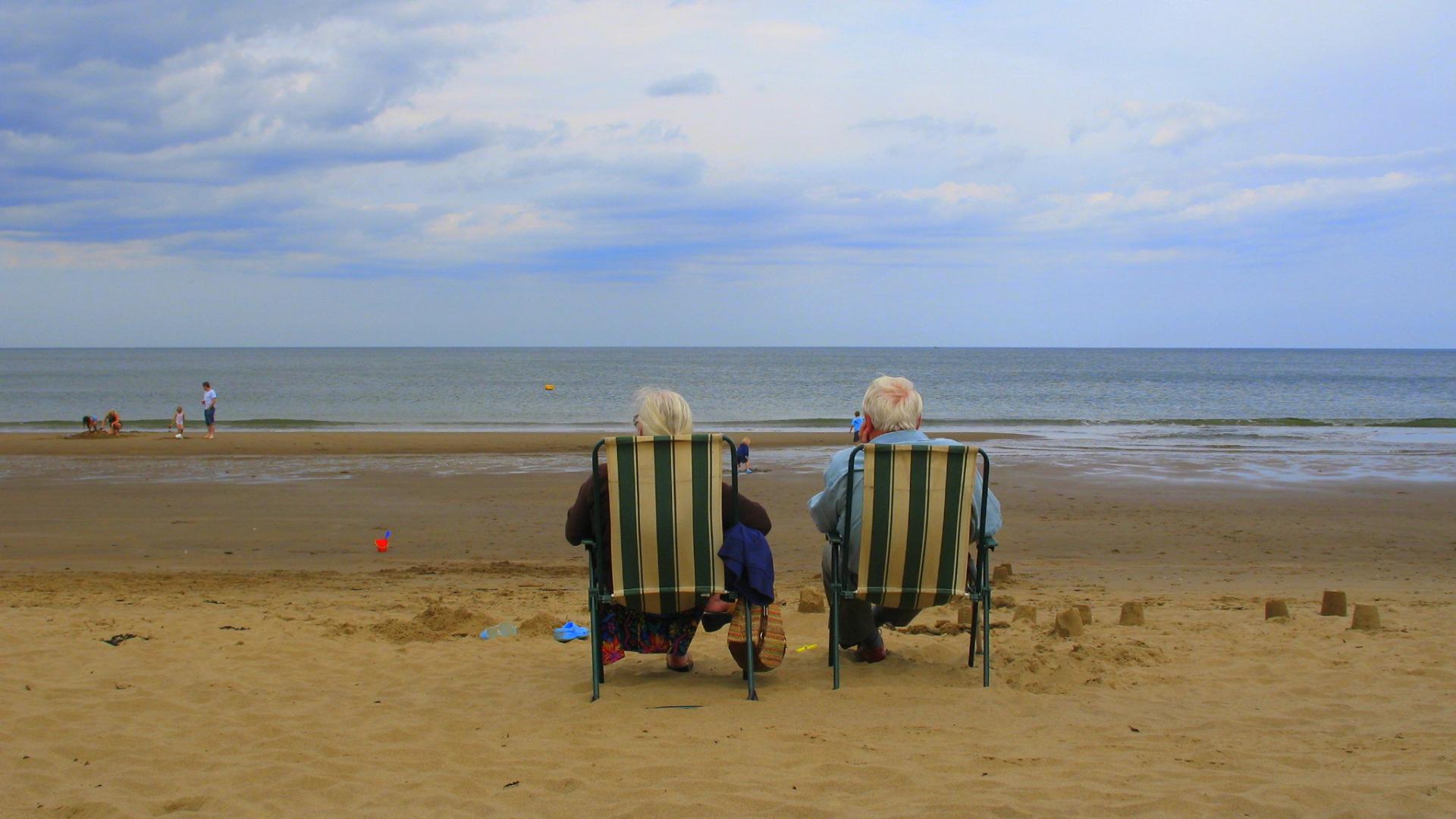 Elderly couple on a beach